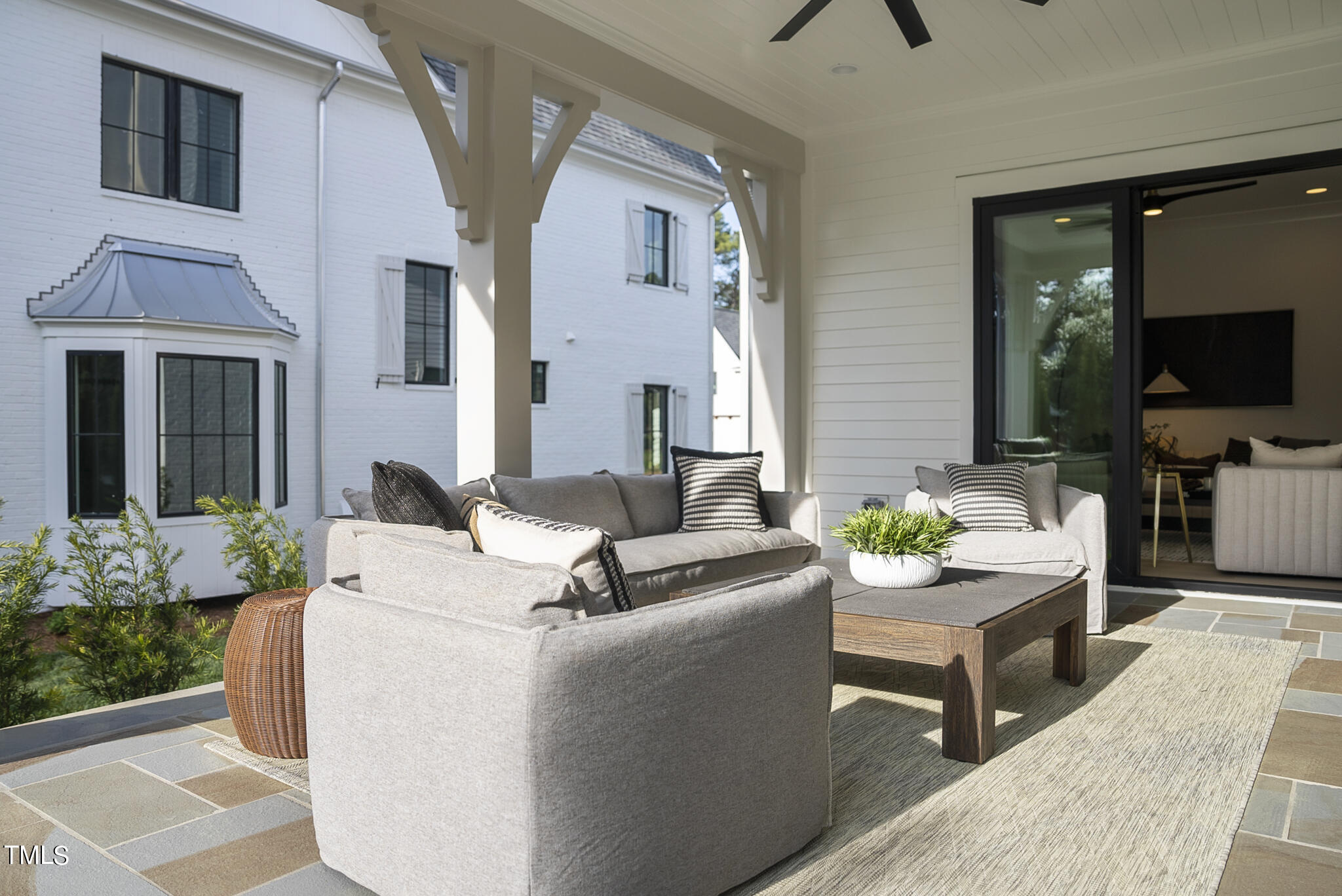 3305 Founding Place Raleigh, NC 27612 - Photo 77 of 100 a living room with furniture and a flat screen tv
