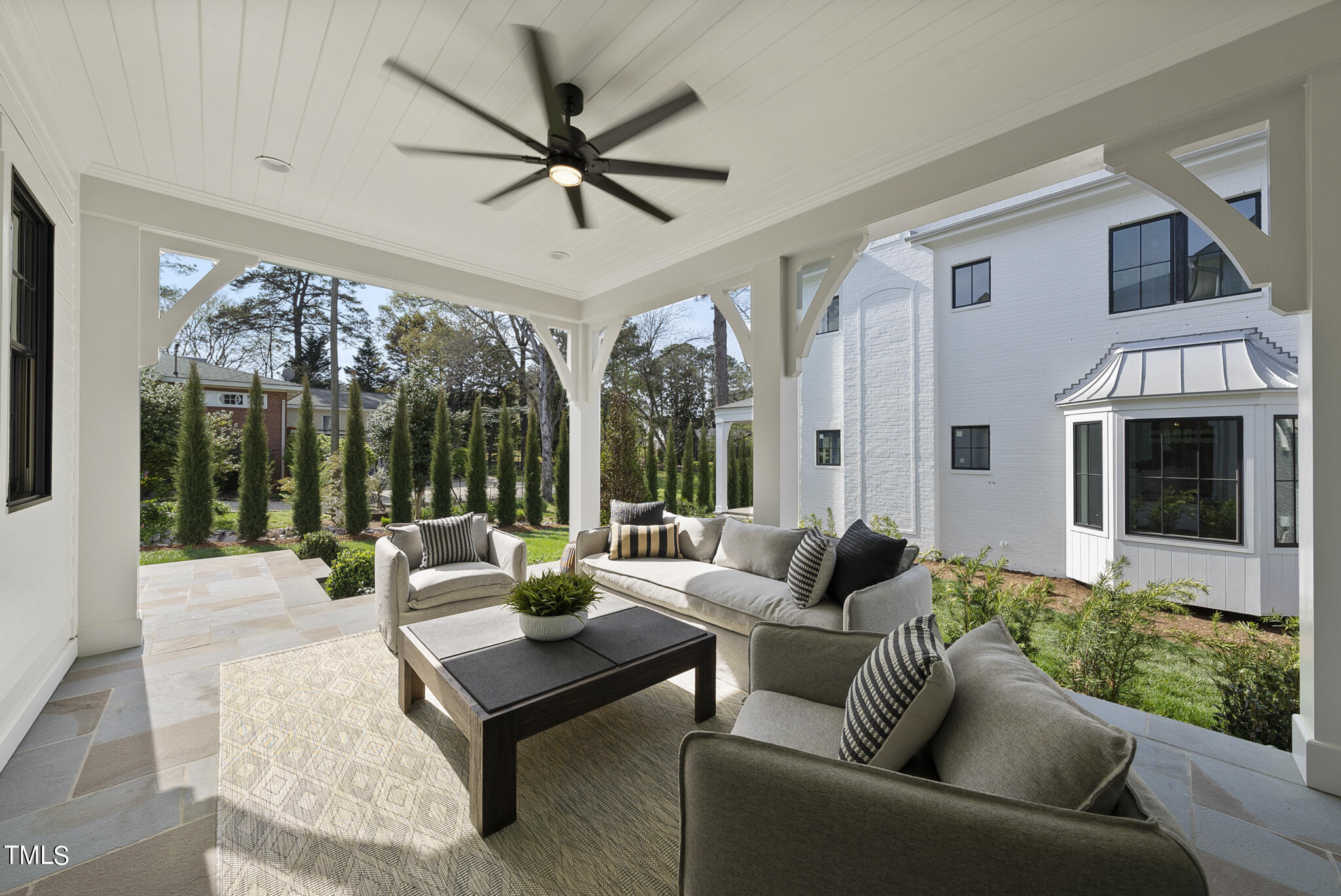 3305 Founding Place Raleigh, NC 27612 - Photo 8 of 100 a living room with furniture ceiling fan and a large window