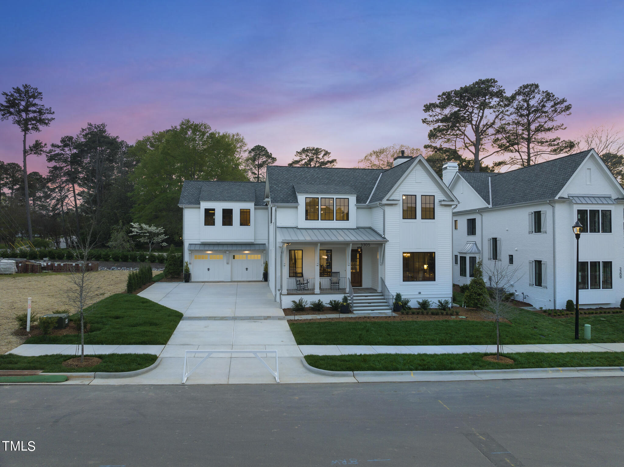 3305 Founding Place Raleigh, NC 27612 - Photo 81 of 100 a front view of a house with a yard and trees