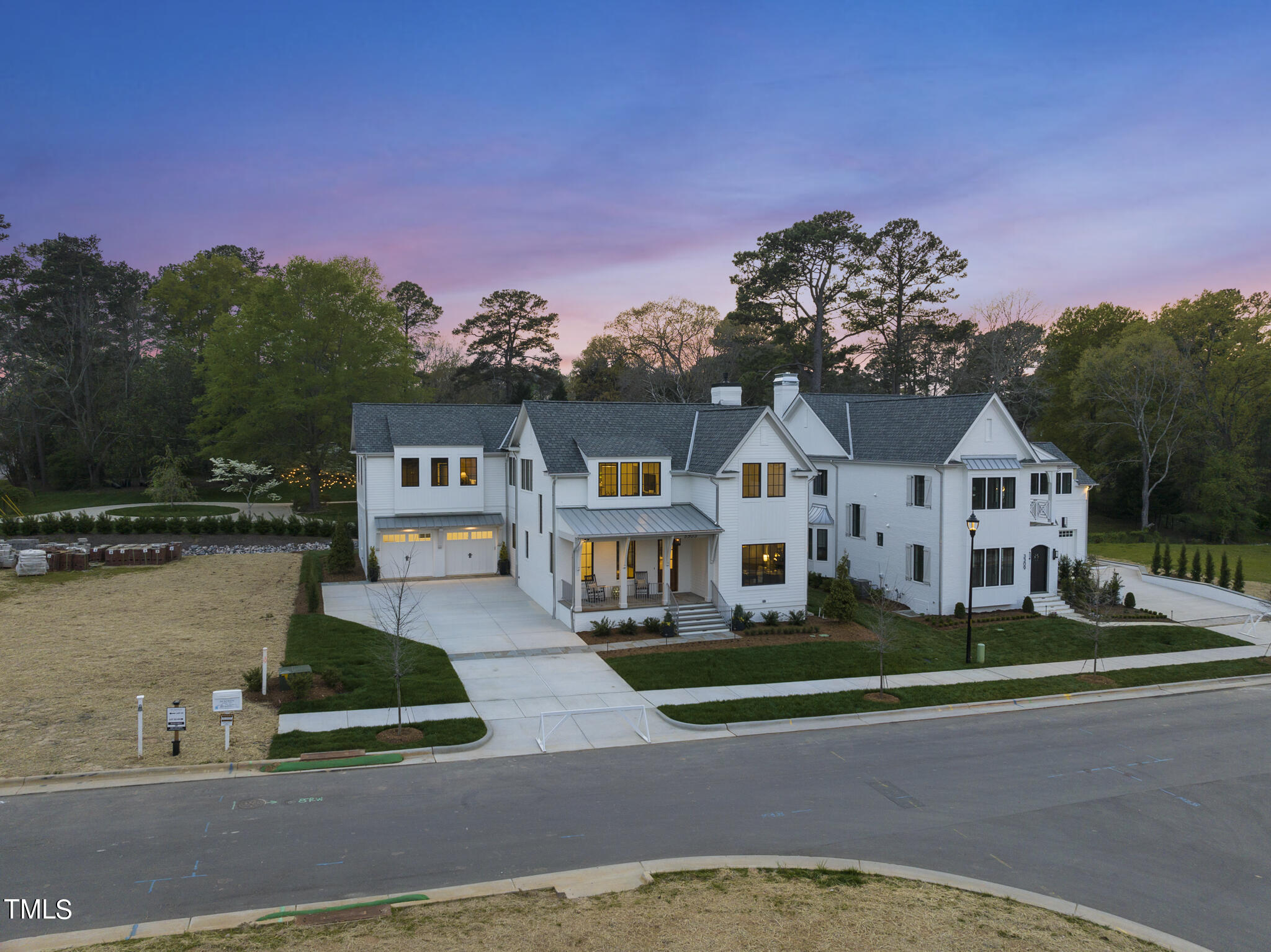 3305 Founding Place Raleigh, NC 27612 - Photo 84 of 100 a front view of a house with a garden and a yard
