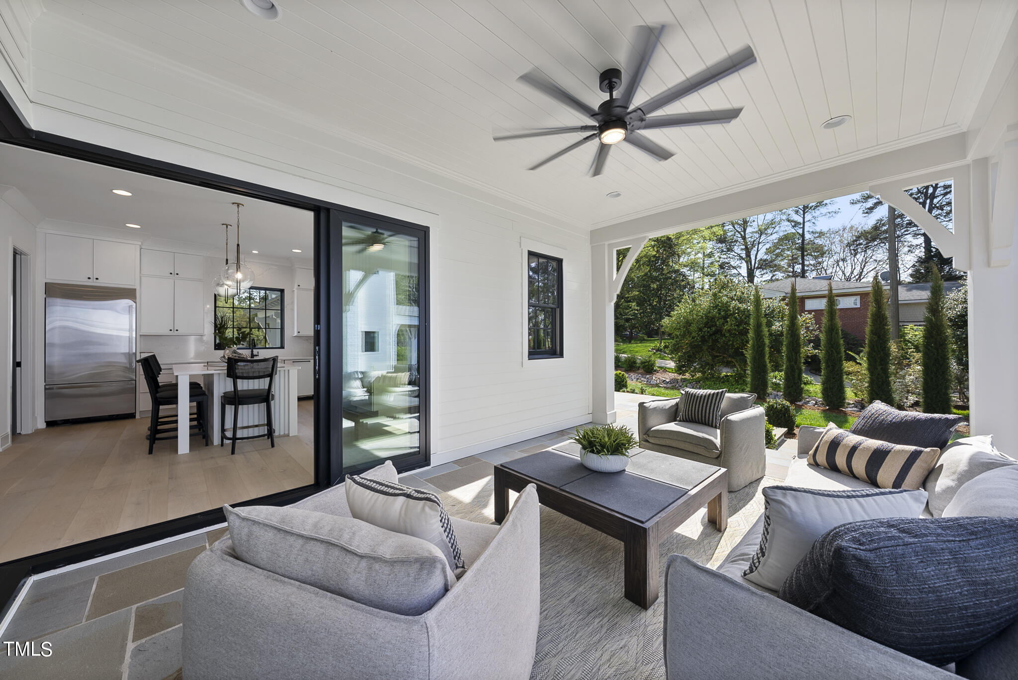 3305 Founding Place Raleigh, NC 27612 - Photo 10 of 100 a living room with furniture a table and a large window