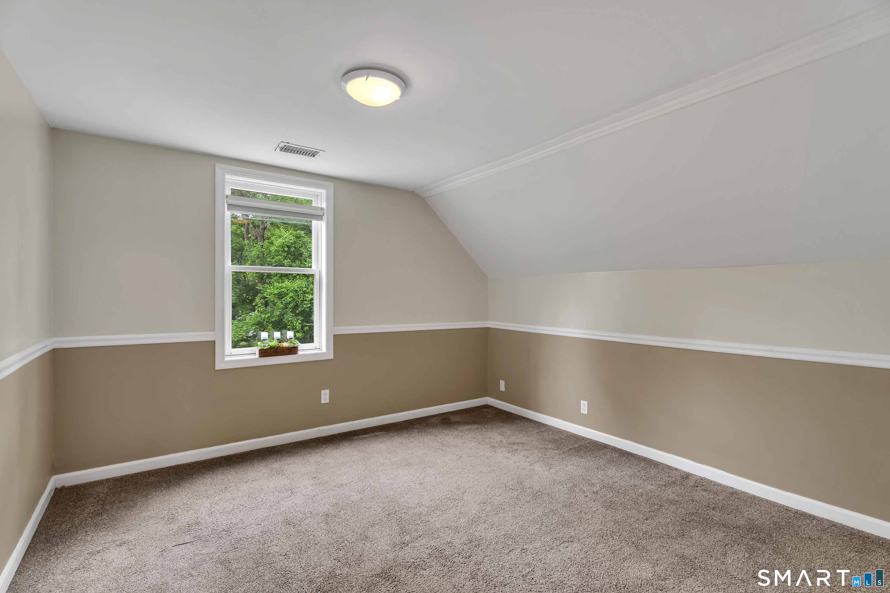 75 Summit Street Norwich, CT 06360 - Photo 29 of 40 an empty room with a window