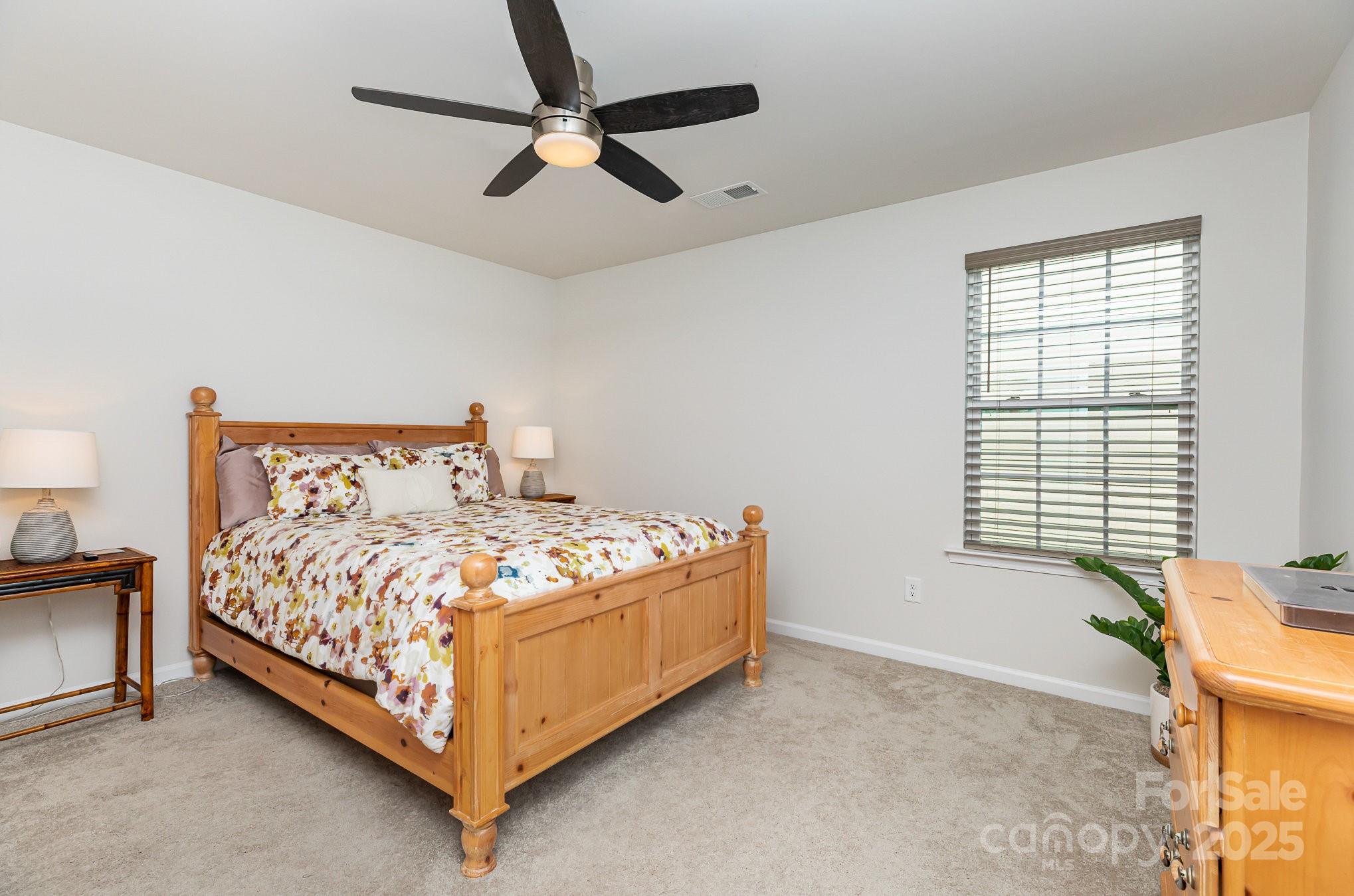 1659 Loggerhead Drive Lancaster, SC 29720 - Photo 17 of 29 a bedroom with a bed dresser and a window