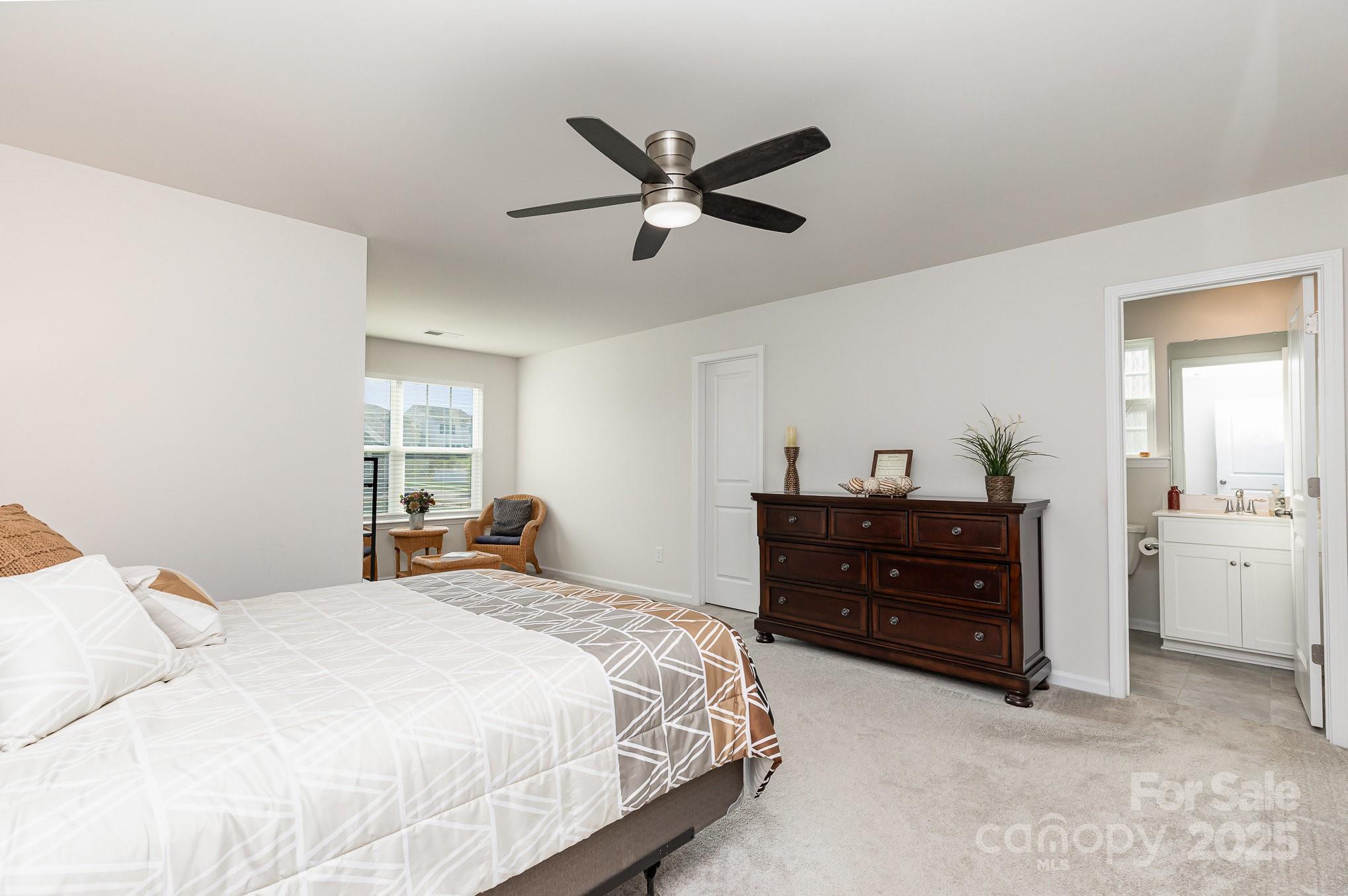 1659 Loggerhead Drive Lancaster, SC 29720 - Photo 22 of 29 a bedroom with a bed and a mirror on dresser