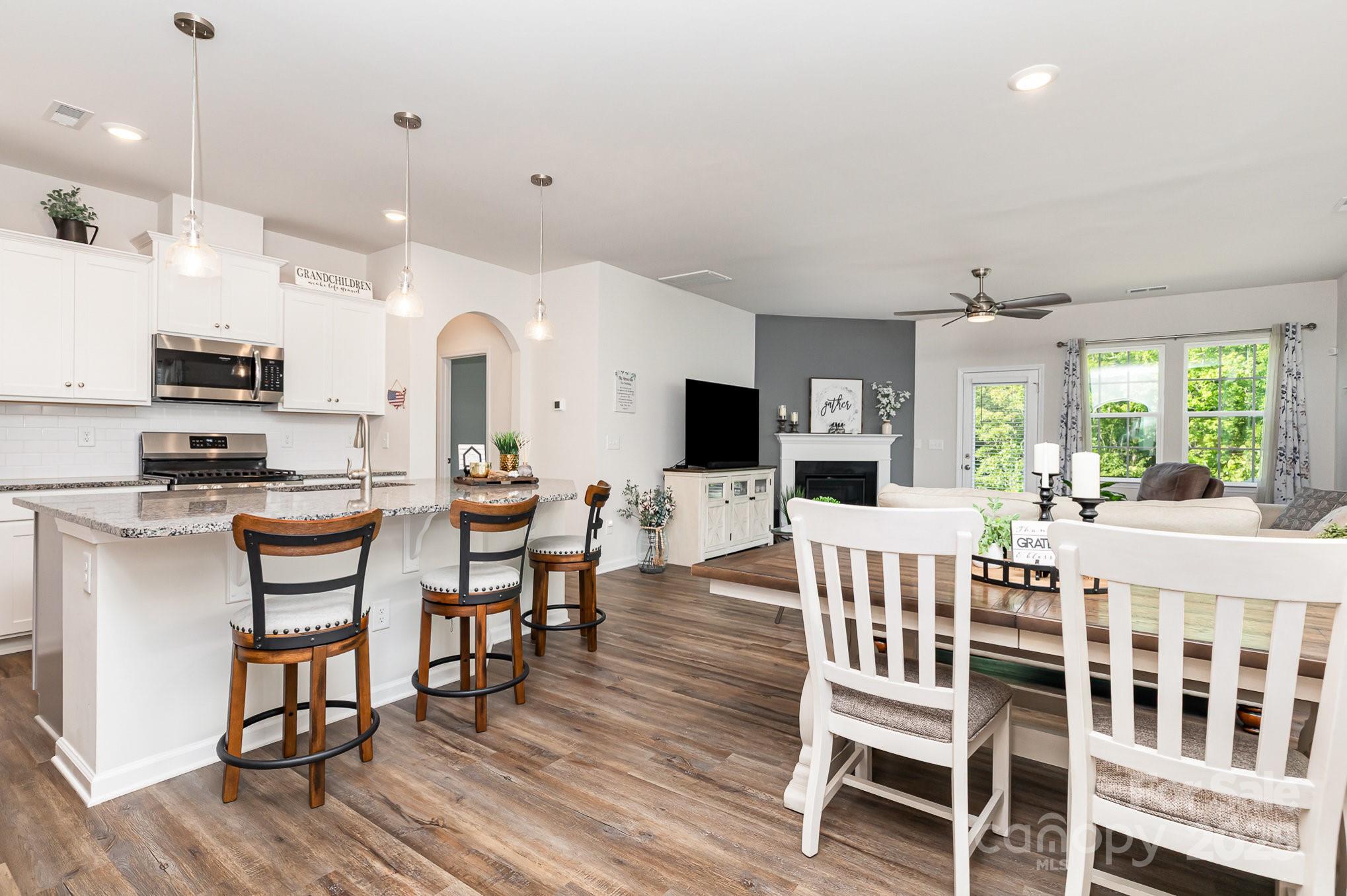 1659 Loggerhead Drive Lancaster, SC 29720 - Photo 5 of 29 a view of a dining room with furniture window and wooden floor