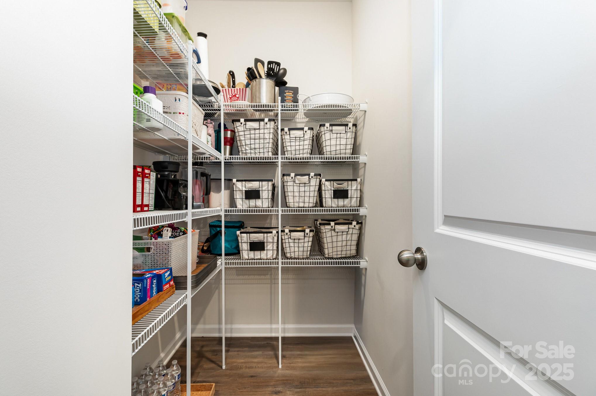 1659 Loggerhead Drive Lancaster, SC 29720 - Photo 6 of 29 a view of a storage & utility room with racks on the wall