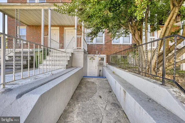 a view of a house with a large window