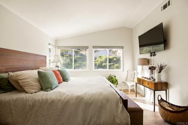 a bathroom with a sink a mirror and a shower