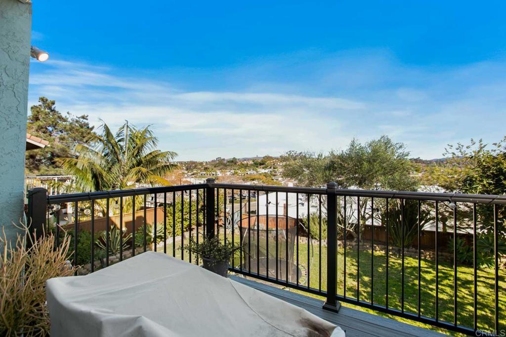381 Via Almansa Encinitas, CA 92024 - Photo 21 of 32 a view of a balcony with wooden floor and fence