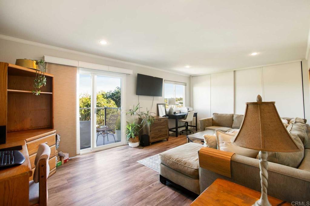 381 Via Almansa Encinitas, CA 92024 - Photo 28 of 32 a living room with furniture and a flat screen tv