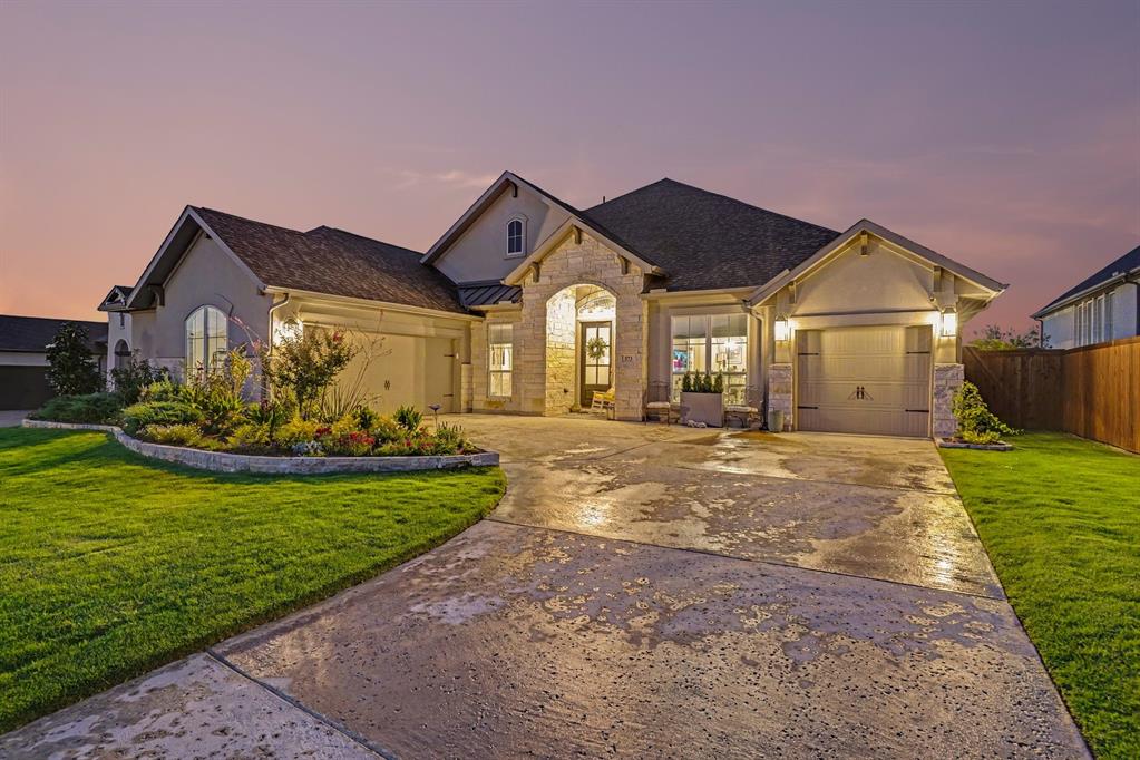 573 Broadleaf Way Haslet, TX 76052 - Photo 2 of 35 a front view of a house with garden