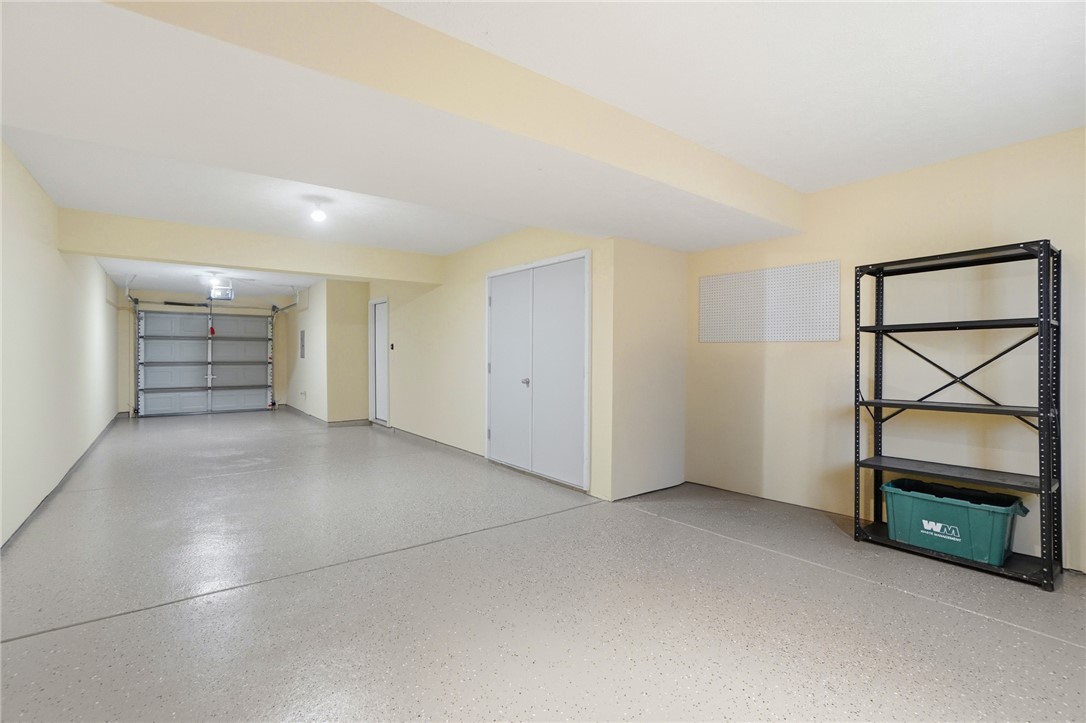 4324 Straight Arrow Road Dayton, OH 45430 - Photo 35 of 40 This spacious garage offers ample room for parking and convenient storage solutions.