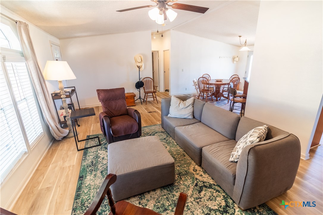 250 Rocky Road Lockhart, TX 78644 - Photo 11 of 45 a living room with furniture and a large window