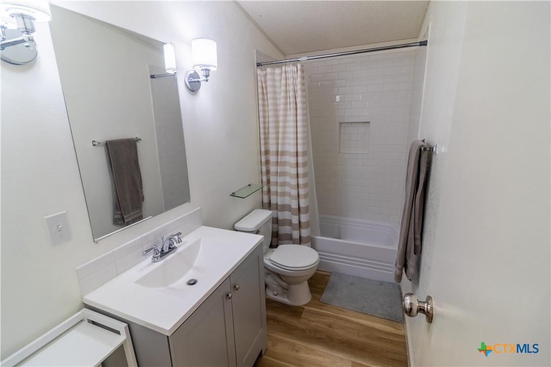250 Rocky Road Lockhart, TX 78644 - Photo 32 of 45 a bathroom with a sink toilet and shower
