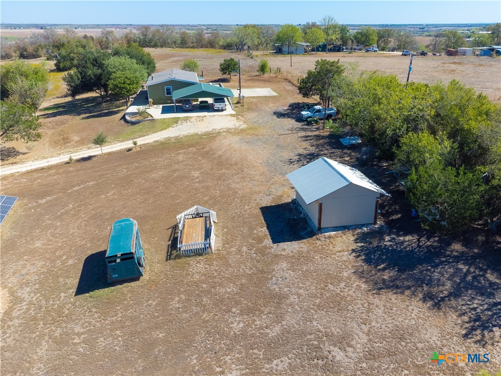 250 Rocky Road Lockhart, TX 78644 - Photo 35 of 45 an aerial view of a house with outdoor space and lake view