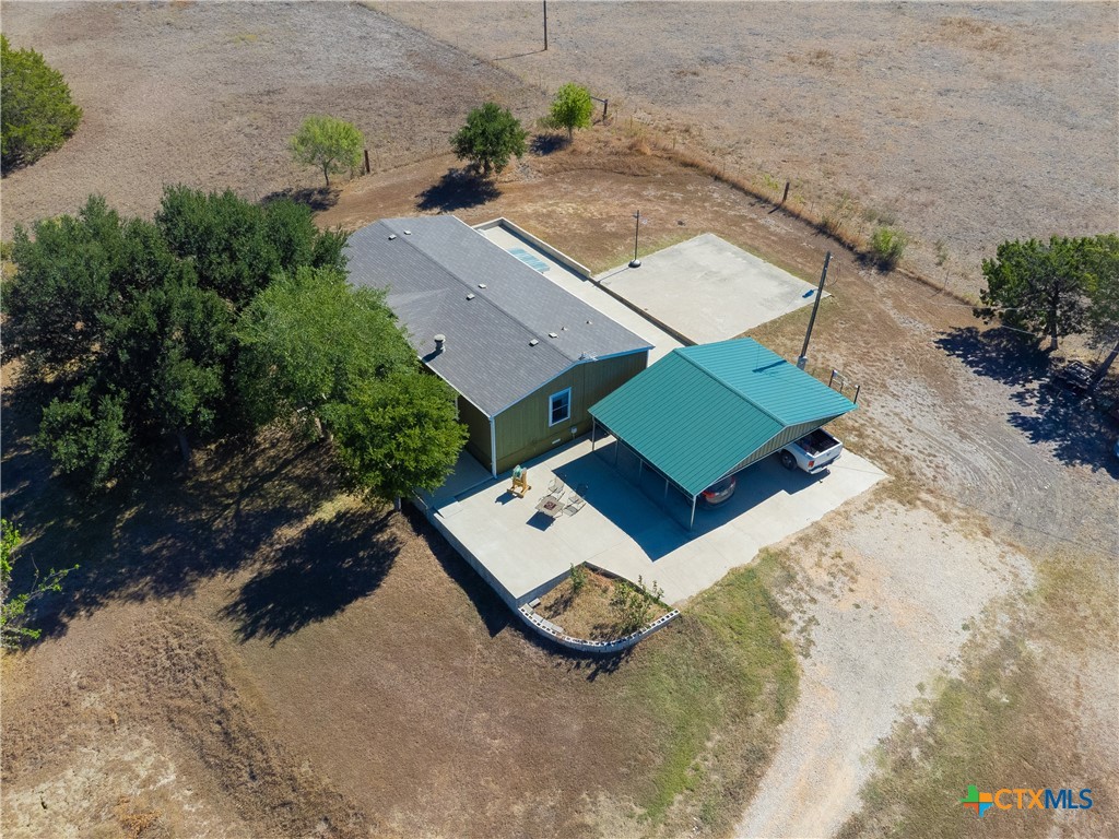 250 Rocky Road Lockhart, TX 78644 - Photo 37 of 45 an aerial view of a house with a backyard