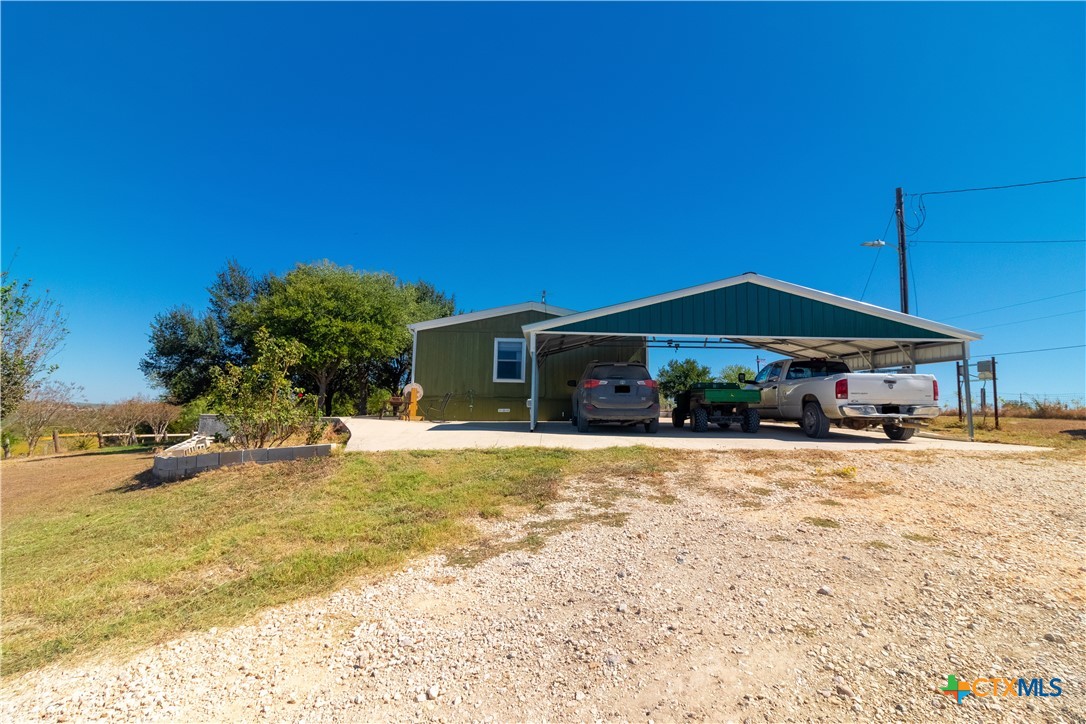 250 Rocky Road Lockhart, TX 78644 - Photo 45 of 45 a view of a house with backyard and sitting area