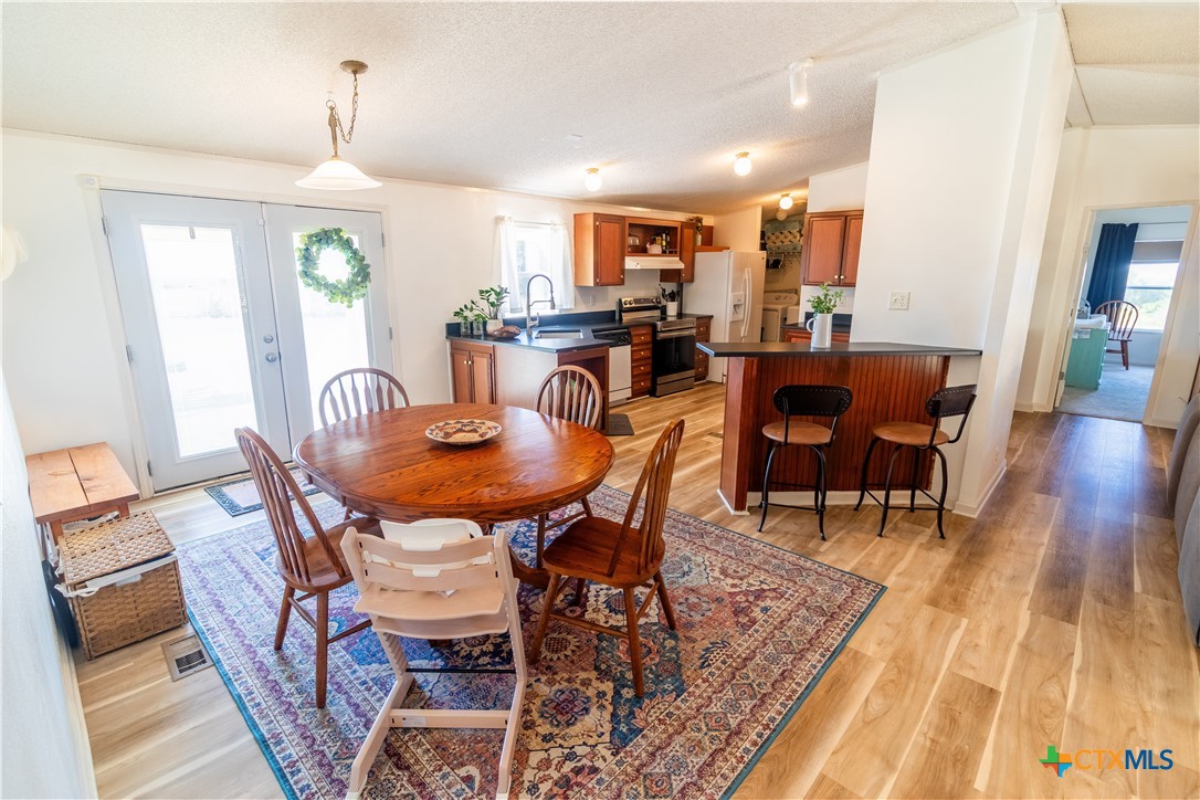 250 Rocky Road Lockhart, TX 78644 - Photo 7 of 45 a view of a dining room with furniture