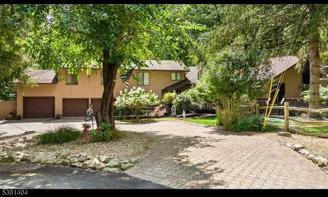 a view of a backyard of the house