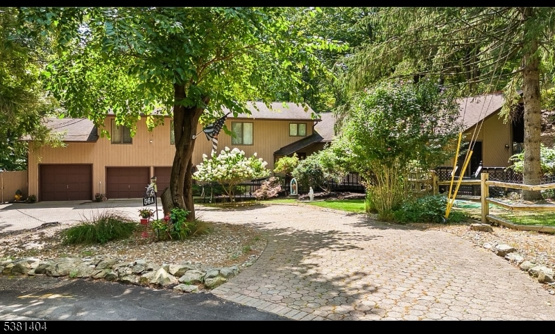 a view of a backyard of the house