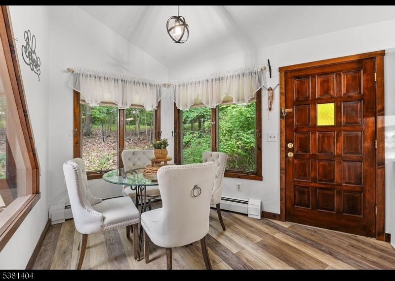 56 Sleepy Hollow Road Andover, NJ 07821 - Photo 12 of 37 a living room with furniture and a window