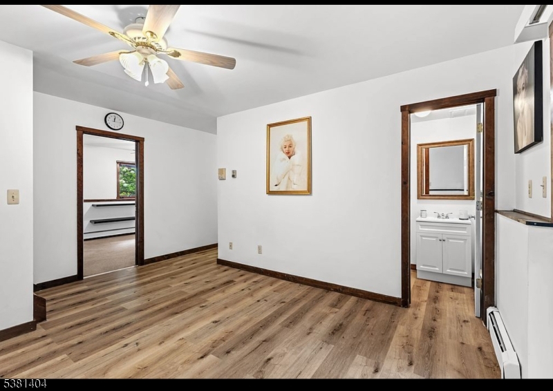 56 Sleepy Hollow Road Andover, NJ 07821 - Photo 19 of 37 wooden floor in an empty room