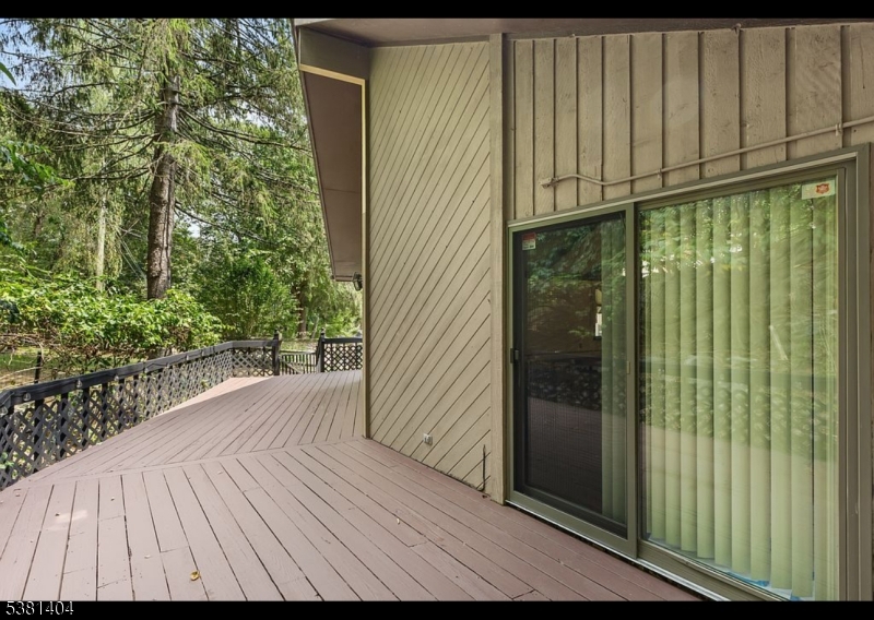 56 Sleepy Hollow Road Andover, NJ 07821 - Photo 33 of 37 a view of a house with wooden floor
