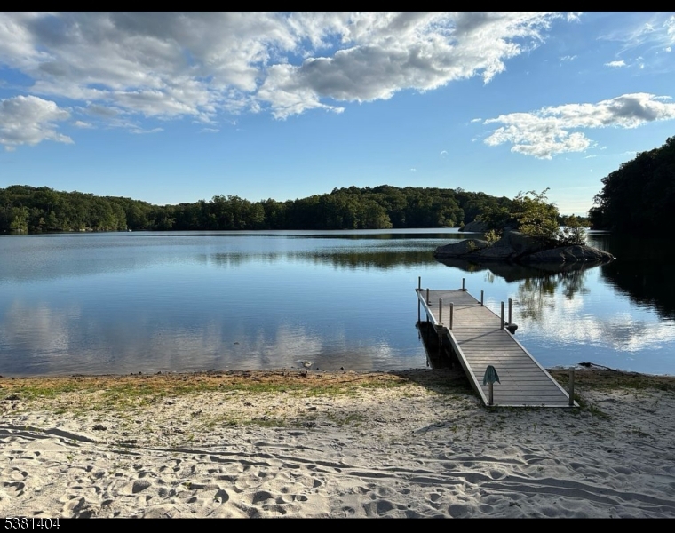 56 Sleepy Hollow Road Andover, NJ 07821 - Photo 34 of 37 a view of a lake from a yard