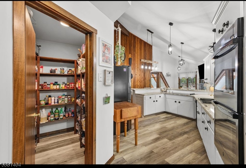56 Sleepy Hollow Road Andover, NJ 07821 - Photo 10 of 37 a view of a kitchen with a window