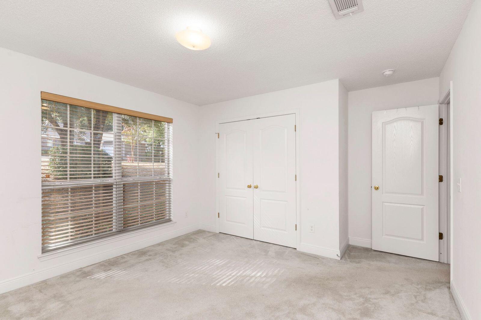 238 Foxchase Way Crestview, FL 32536 - Photo 16 of 33 a view of an empty room with a window