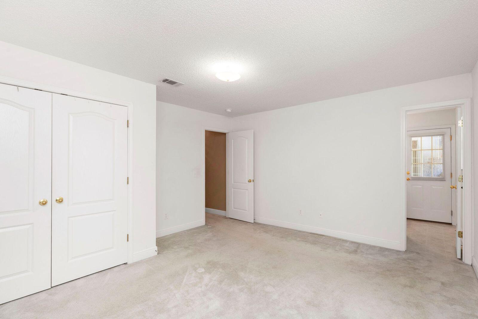 238 Foxchase Way Crestview, FL 32536 - Photo 19 of 33 an empty room with windows