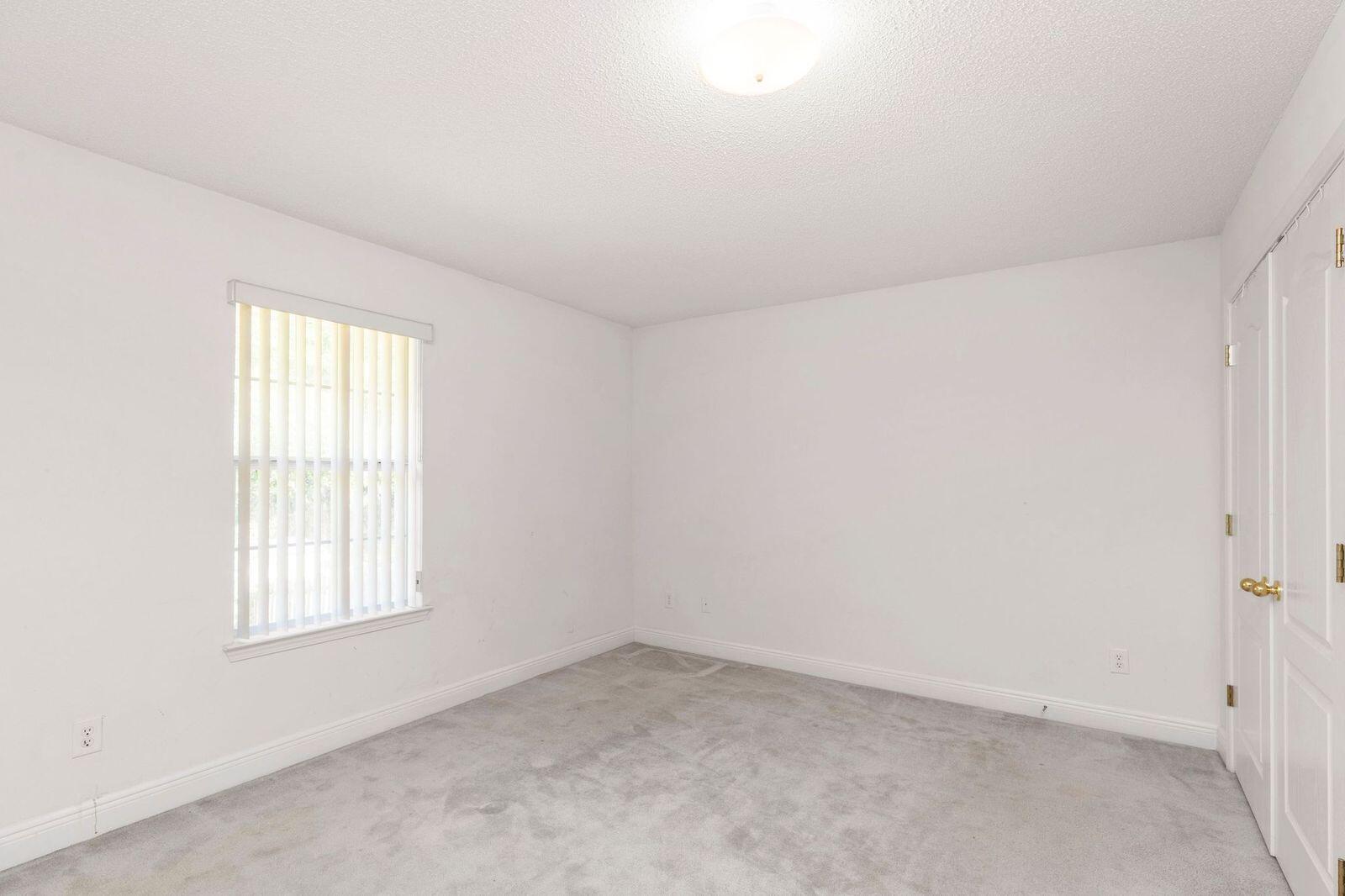 238 Foxchase Way Crestview, FL 32536 - Photo 21 of 33 an empty room with windows