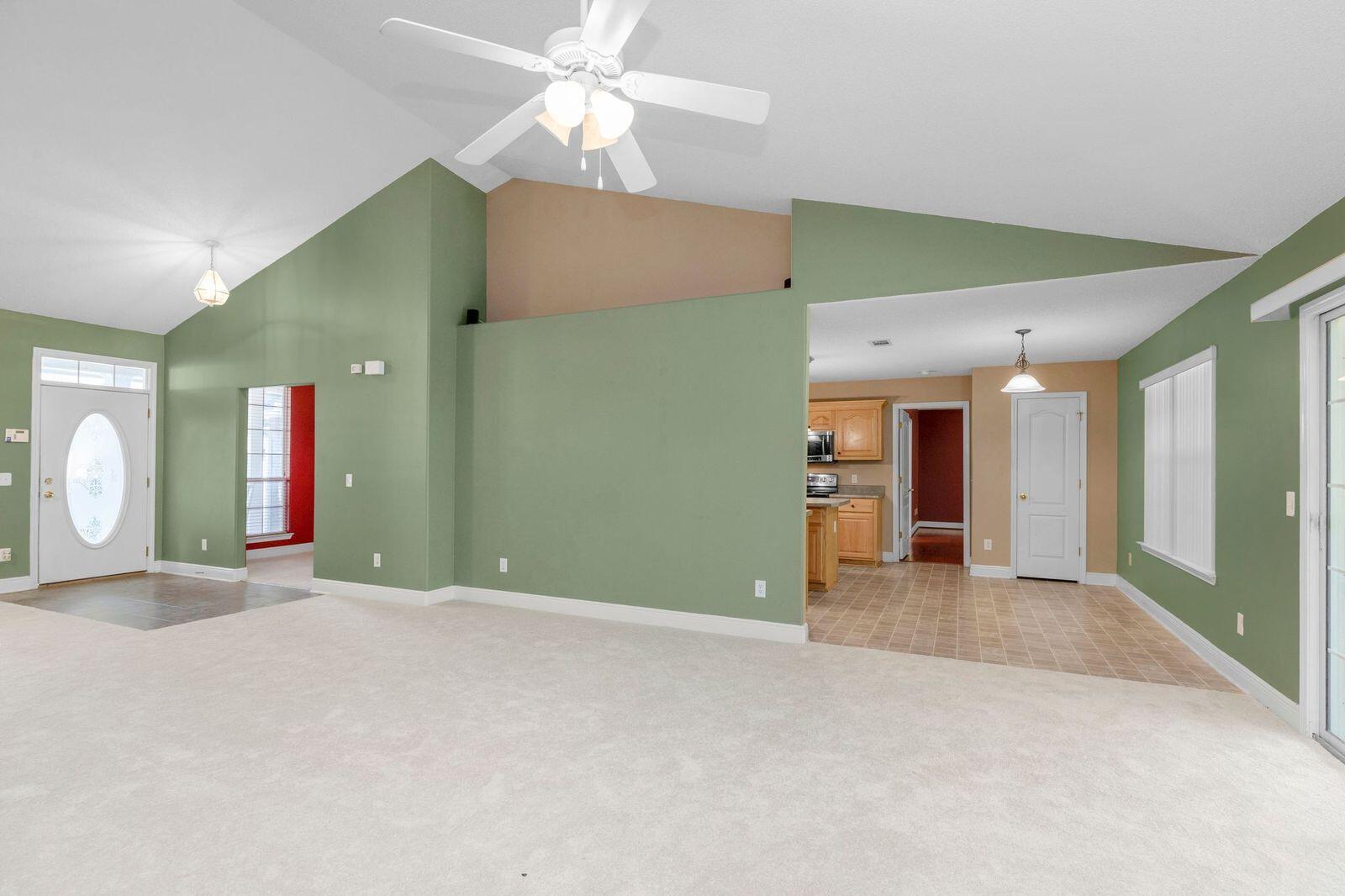238 Foxchase Way Crestview, FL 32536 - Photo 3 of 33 a view of a livingroom with a ceiling fan and window