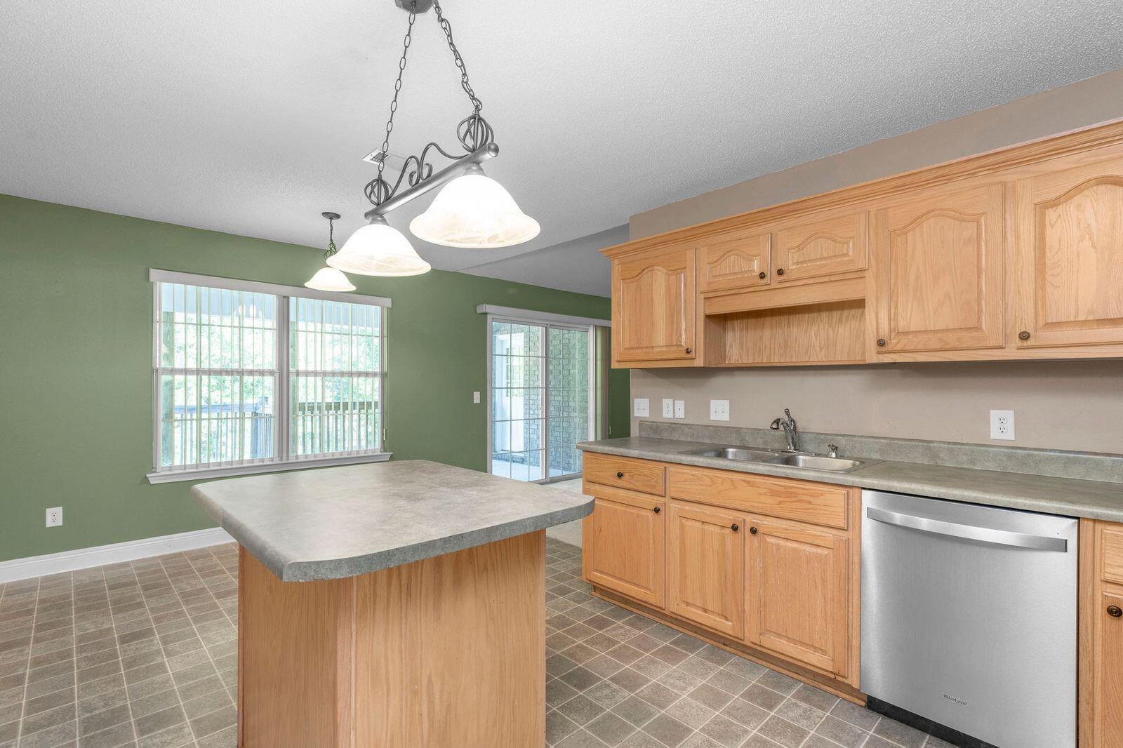 238 Foxchase Way Crestview, FL 32536 - Photo 8 of 33 a kitchen with a sink and cabinets