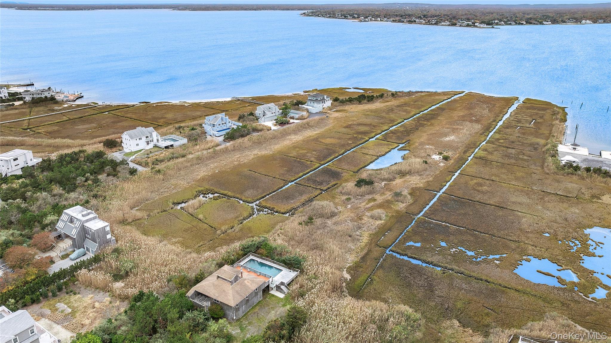 542 Dune Road Westhampton, NY 11978 - Photo 17 of 19 a view of a lake