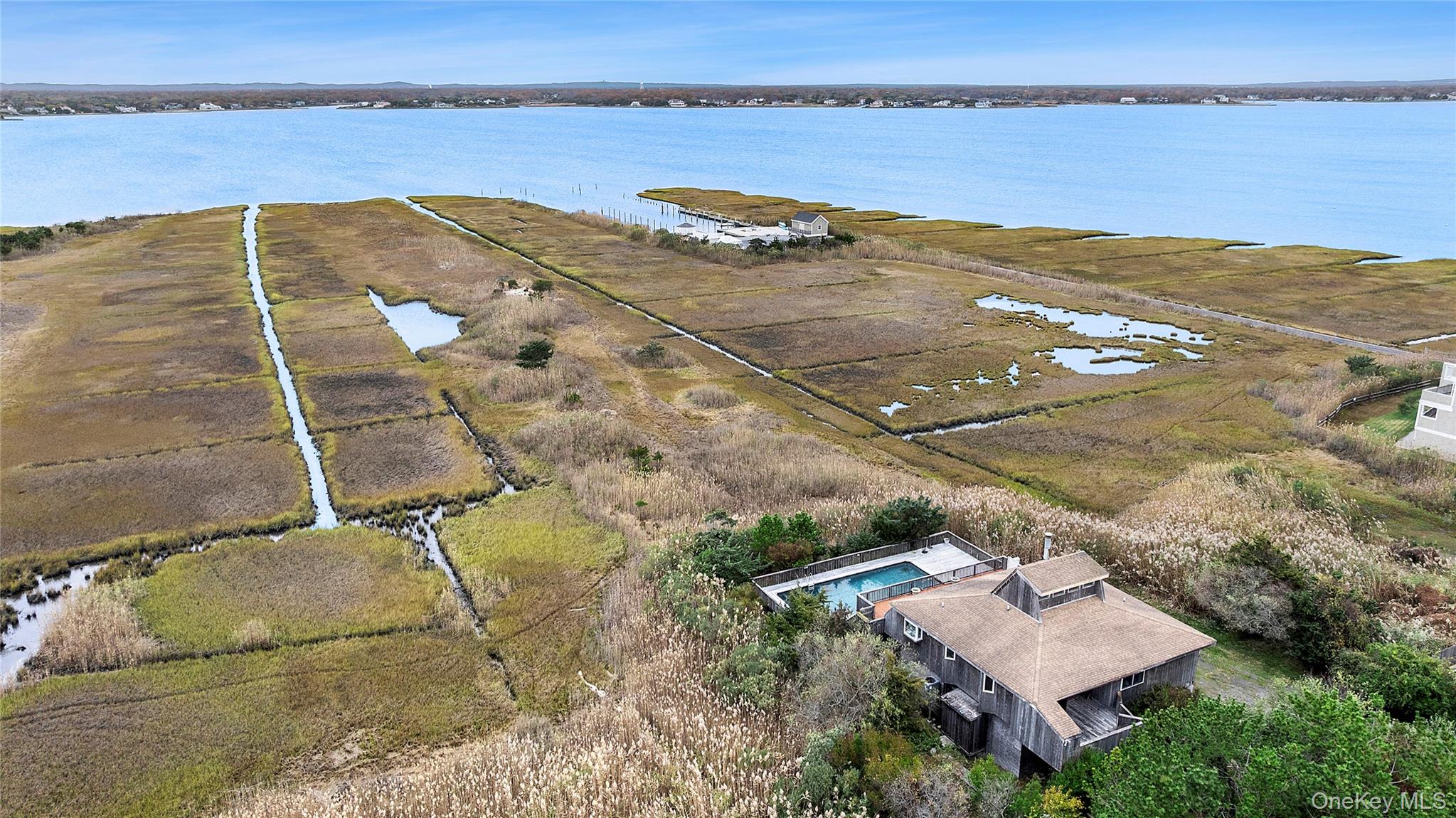 542 Dune Road Westhampton, NY 11978 - Photo 18 of 19 an aerial view of residential houses with outdoor space