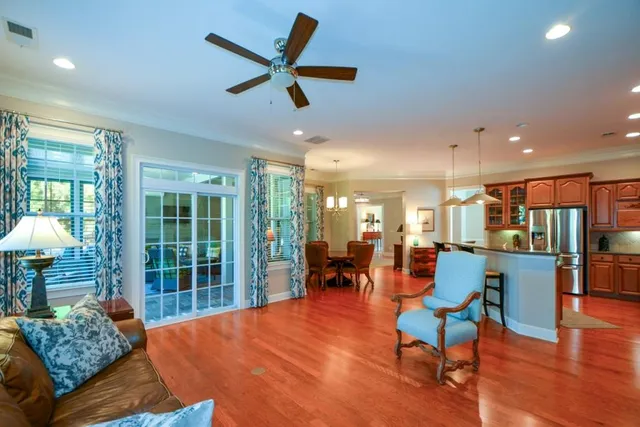 a view of a house with swimming pool and garden