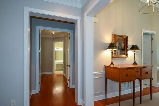 a view of a garden with a building in the background