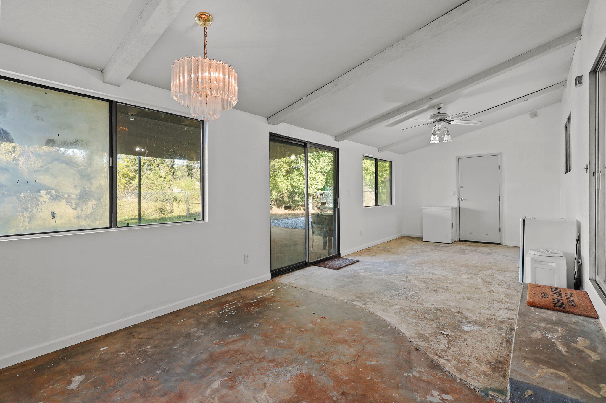 6958 Riverside Drive Redding, CA 96001 - Photo 23 of 30 a view of an empty room with a window