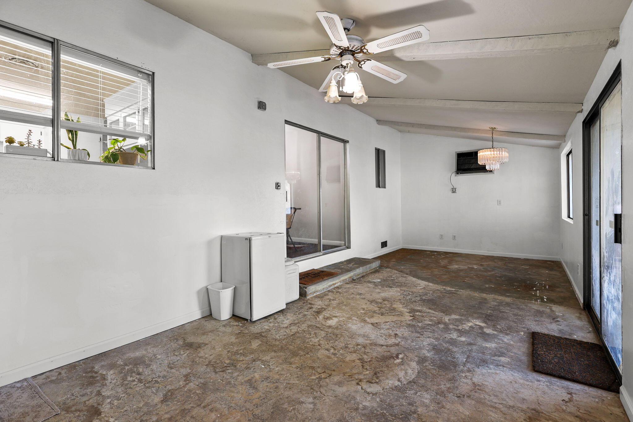6958 Riverside Drive Redding, CA 96001 - Photo 24 of 30 a view of a livingroom with a ceiling fan and window