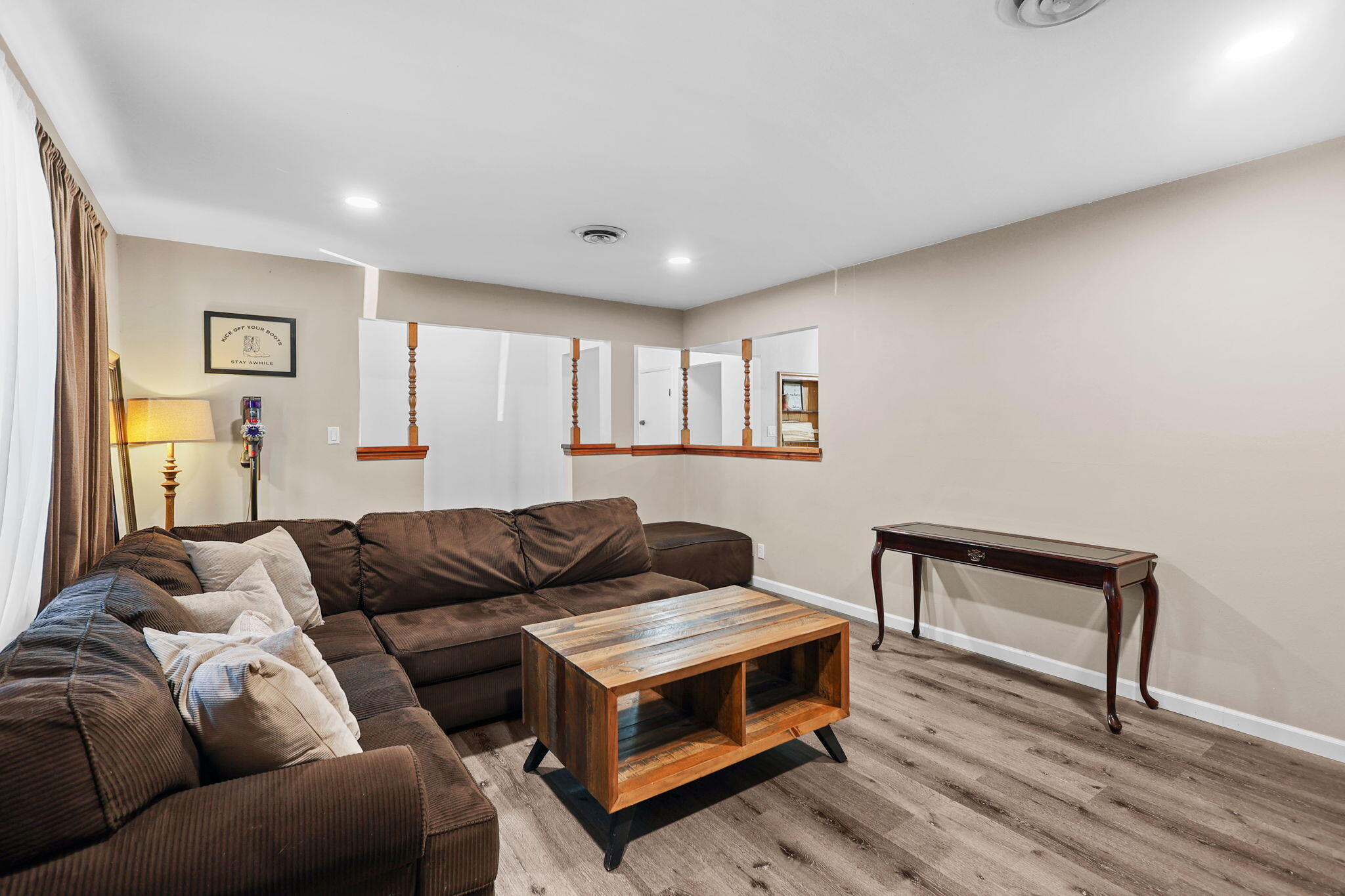 6958 Riverside Drive Redding, CA 96001 - Photo 7 of 30 a living room with furniture and a wooden floor