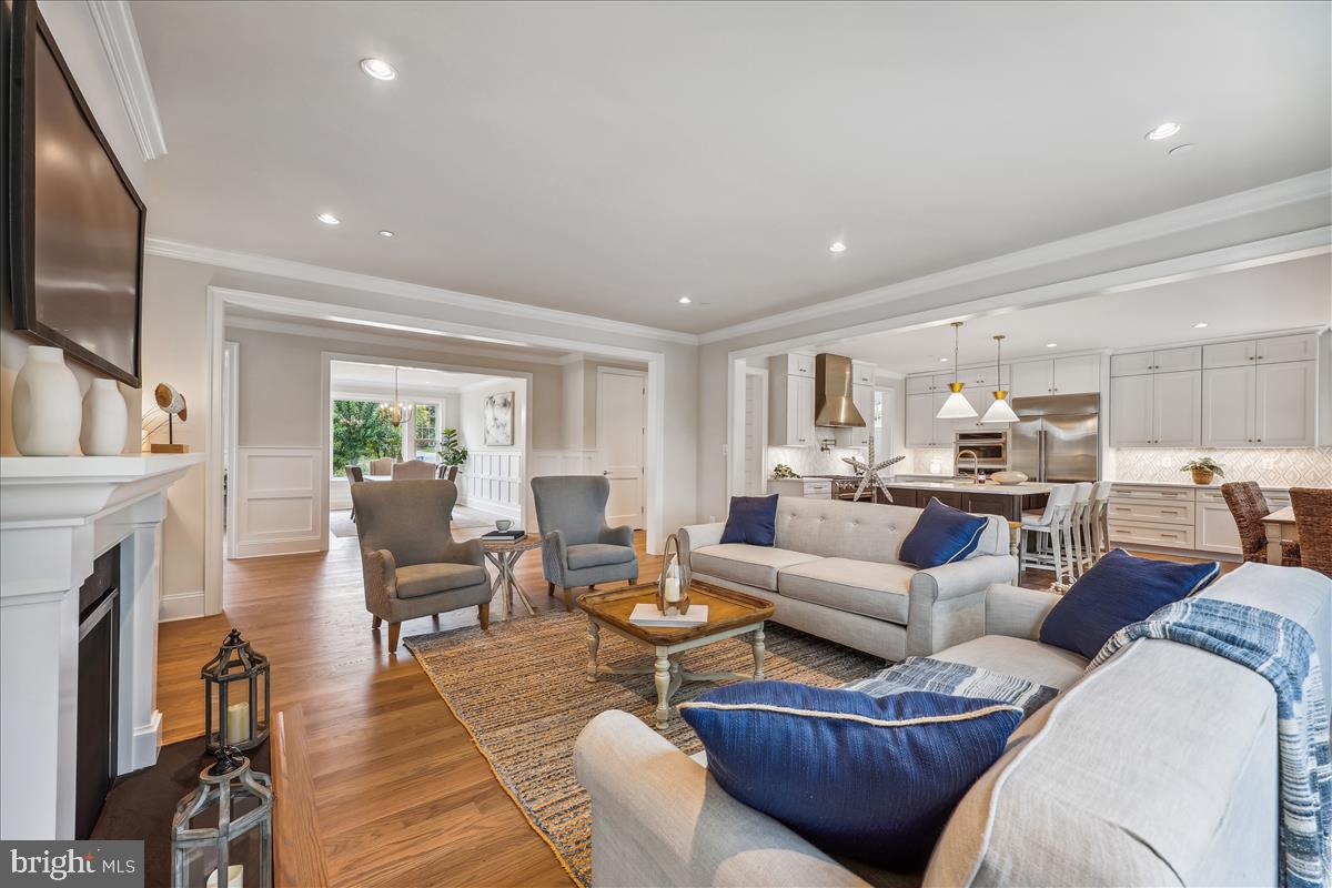 7600 Massena Road Bethesda, MD 20817 - Photo 25 of 102 a living room with furniture fireplace and a flat screen tv