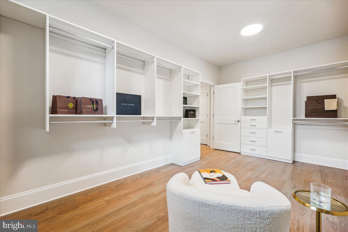 7600 Massena Road Bethesda, MD 20817 - Photo 55 of 102 a living room with furniture and a flat screen tv