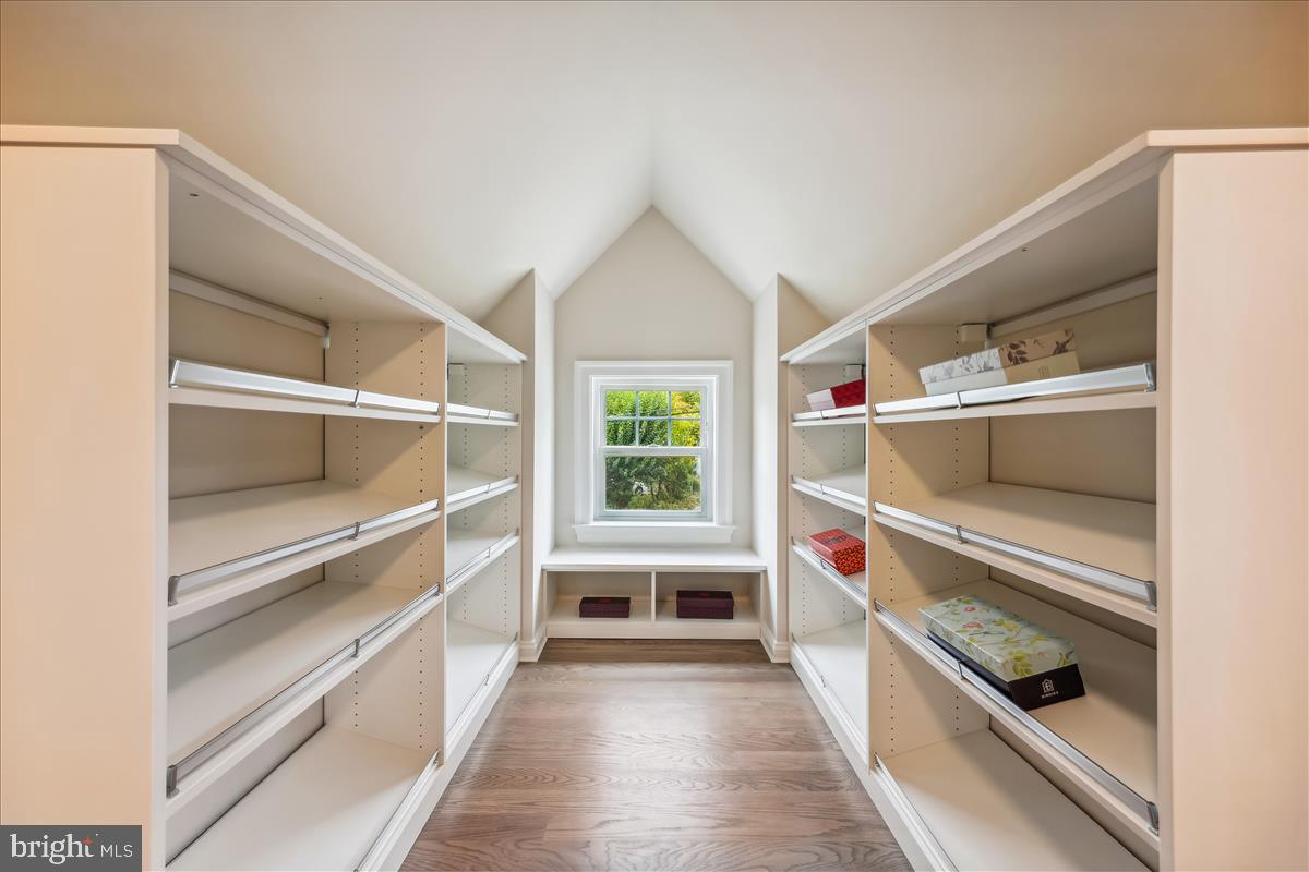 7600 Massena Road Bethesda, MD 20817 - Photo 59 of 102 a storage room with washer and dryer