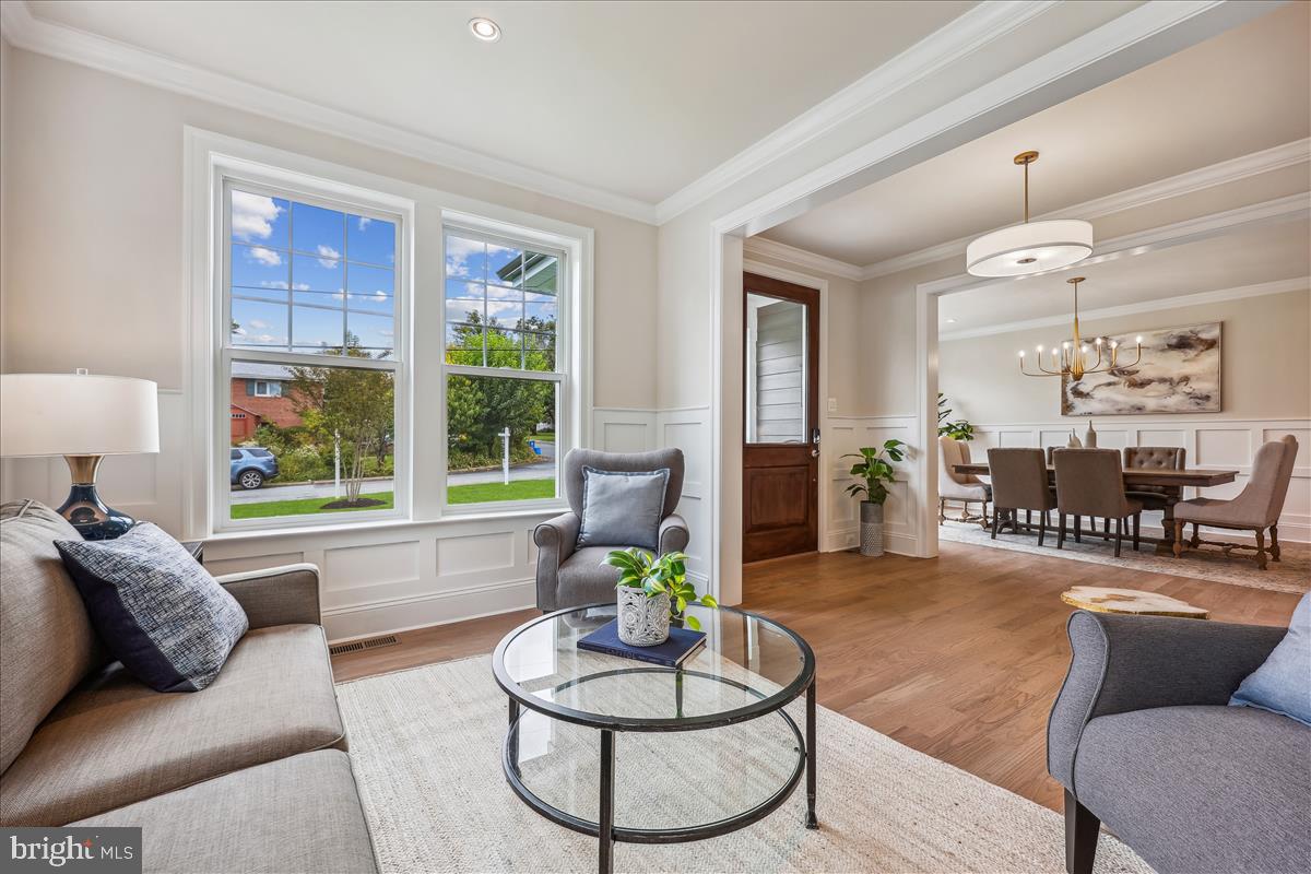 7600 Massena Road Bethesda, MD 20817 - Photo 9 of 102 a living room with furniture and a large window