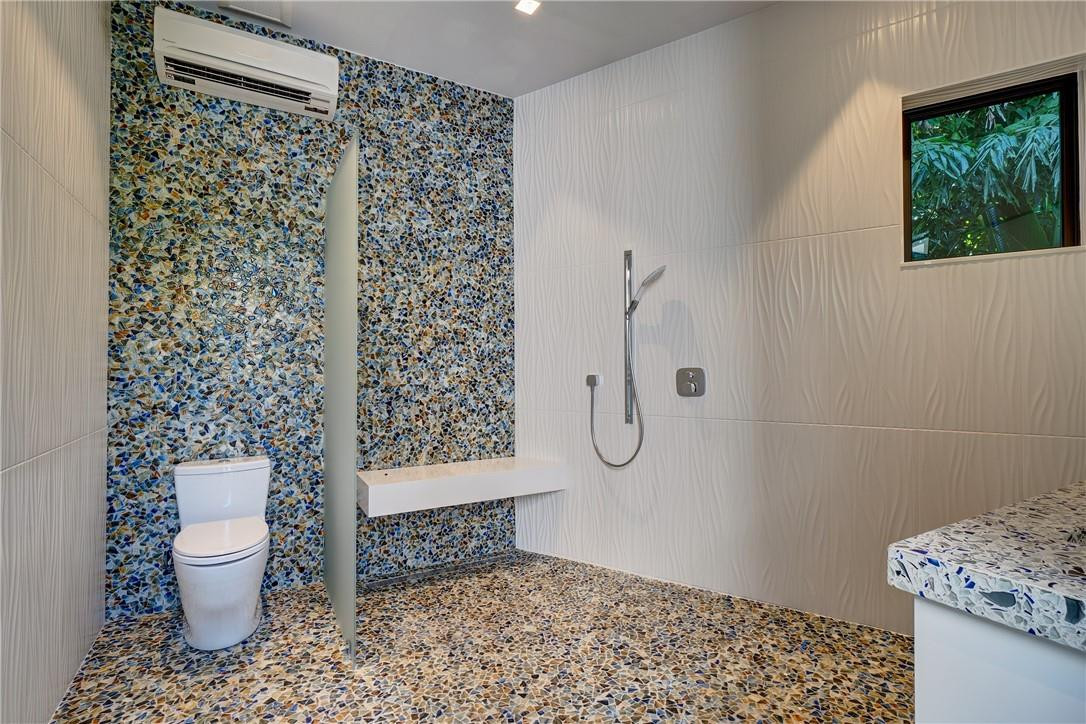 424 Northeast 5th Street Boca Raton, FL 33432 - Photo 25 of 51 a bathroom with a toilet sink and shower