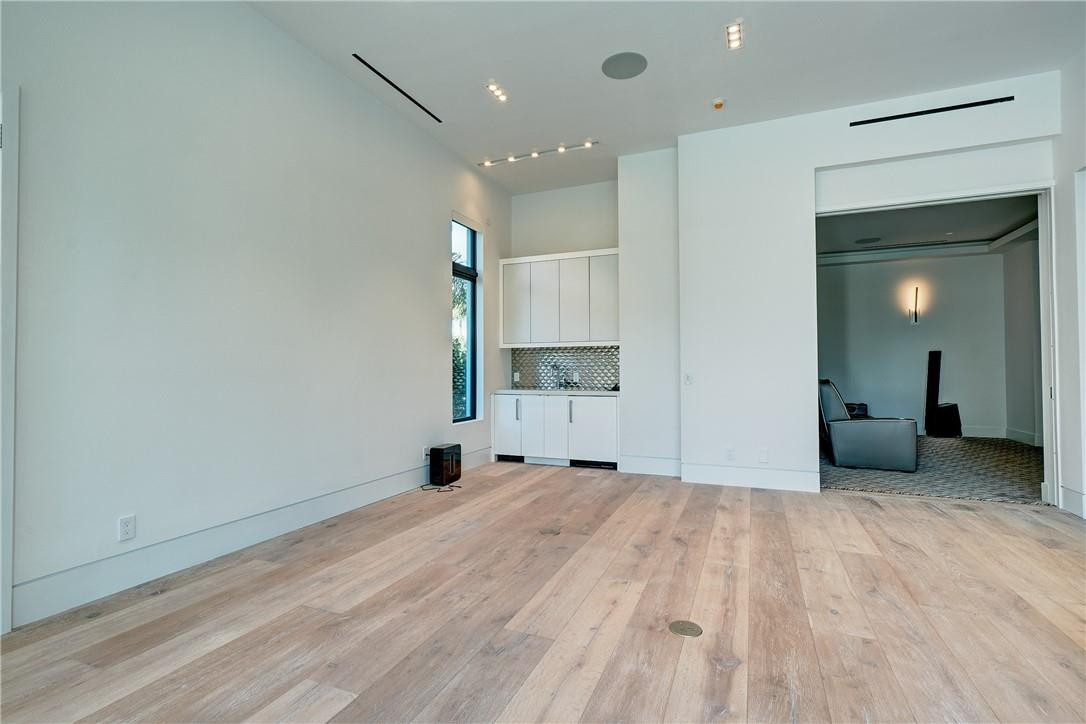 424 Northeast 5th Street Boca Raton, FL 33432 - Photo 41 of 51 a view of a livingroom with wooden floor and a bathroom