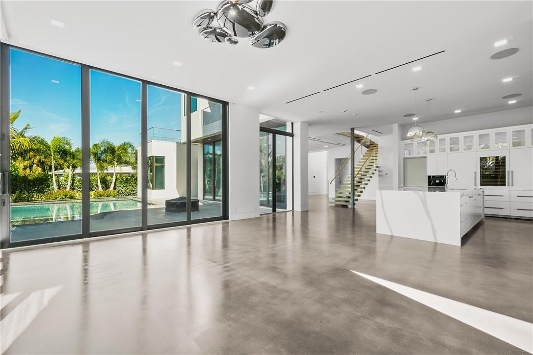 424 Northeast 5th Street Boca Raton, FL 33432 - Photo 8 of 51 a view of a living room and a floor to ceiling window