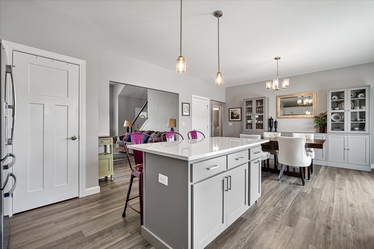 507 Raef Road Downs, IL 61736 - Photo 13 of 37 a view of a kitchen and sink and wooden floor