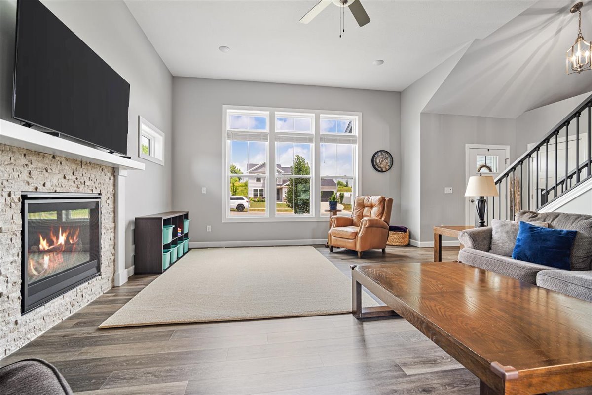 507 Raef Road Downs, IL 61736 - Photo 6 of 37 a living room with furniture and a fireplace